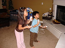 Video game check!  What games are you playing?-kidsplayingwii.jpg