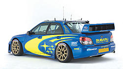 If money wasn't an option what modifications would you make to your car?-subaru_impreza_wrc_07_blue_07.jpg