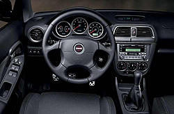 I've searched, but I can't find: Photos of the '04 WRX gauge cluster, non-STI.-subaru-wrx-new-2004-inside-view.jpg