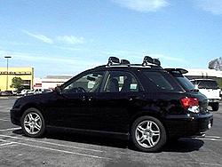 04 black wagon w/ thule snow cat and headlight mod...-1_small.jpg