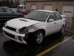 Been out for a year.....crashed STI's-ouch.jpg