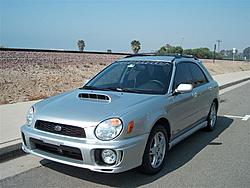 Got my sideskirts painted and put an sti hoodscoop on my wagon-wrxcapo.jpg