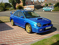 Never seen this STI before...-sti-front-angle-view.jpg