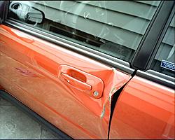 I'm an Idiot! look what happened to my car!!!-door-dent.jpg