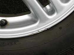 FS: Stock WRX Rims with Pretty Bald RE92's-tire-1-rash.jpg